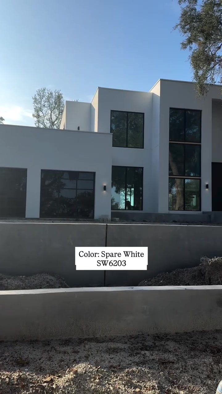 Modern home exterior as construction progresses